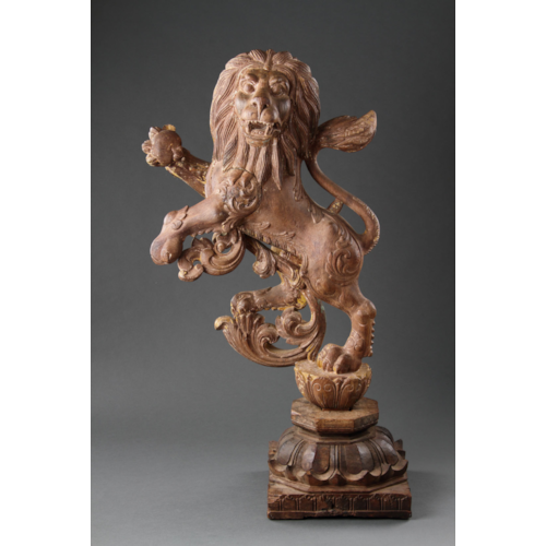 A Fine and Decorative Pair of Rampant Lions